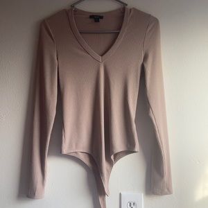 Nude ribbed longsleeve bodysuit with snap bottom